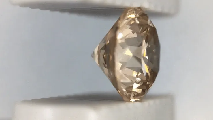 0.55 Carat Pale Apricot Color Natural Loose Fancy Light Brown Diamond | Round Brilliant VVS2 Clarity