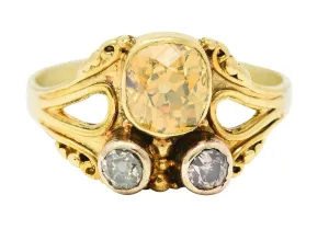 Arts & Crafts 1.38 CTW Fancy Colored Old Mine & European Cut Diamond 14 Karat Yellow Gold Antique Three Stone Ring