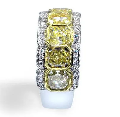Breathtaking Totaling 5.39 ctw Radiant Cut Fancy Yellow Diamond Ring