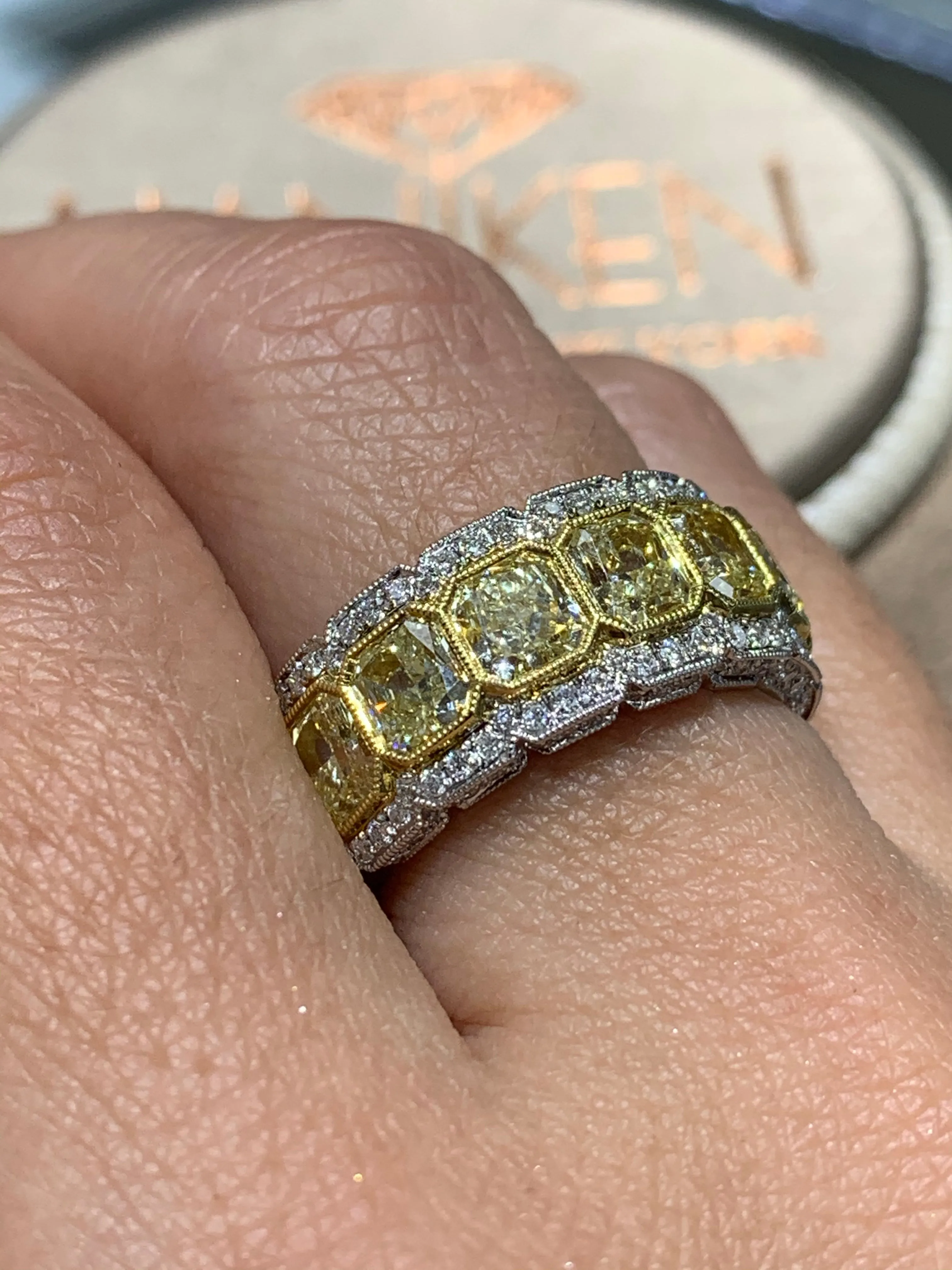 Breathtaking Totaling 5.39 ctw Radiant Cut Fancy Yellow Diamond Ring