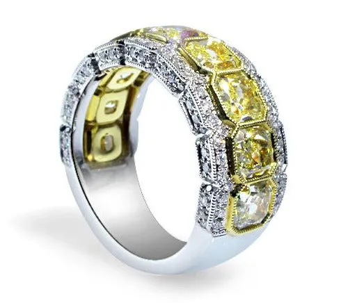 Breathtaking Totaling 5.39 ctw Radiant Cut Fancy Yellow Diamond Ring