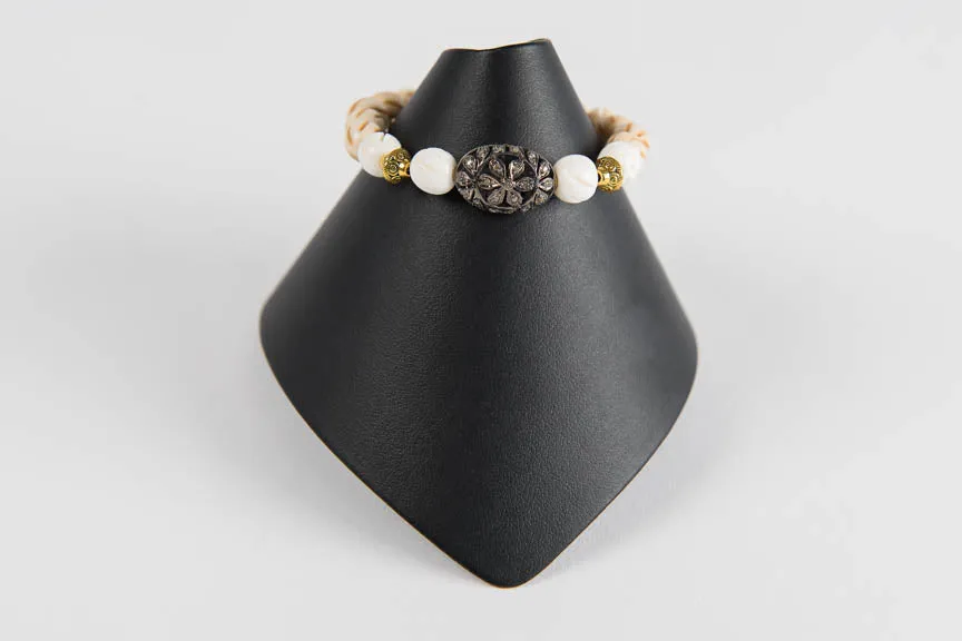 Carved bone and wood with pave diamond bead