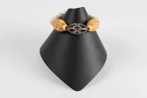 Carved wood and bone with pave diamond bead