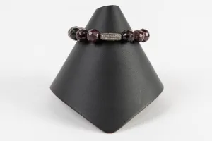 Faceted garnet and pave diamond bar