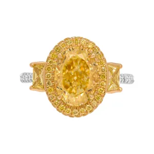 GIA Certified 3 stone Ring with 3.33ct Fancy Yellow VVS2 Oval Diamond