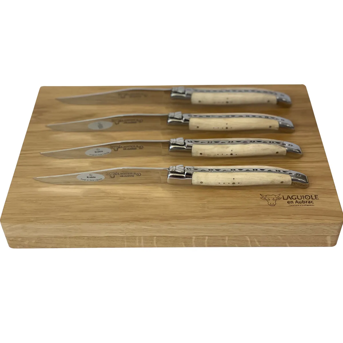 Laguiole en Aubrac Handcrafted 4-Piece Steak Knife Set with Wavy Natural Maple Wood Handles