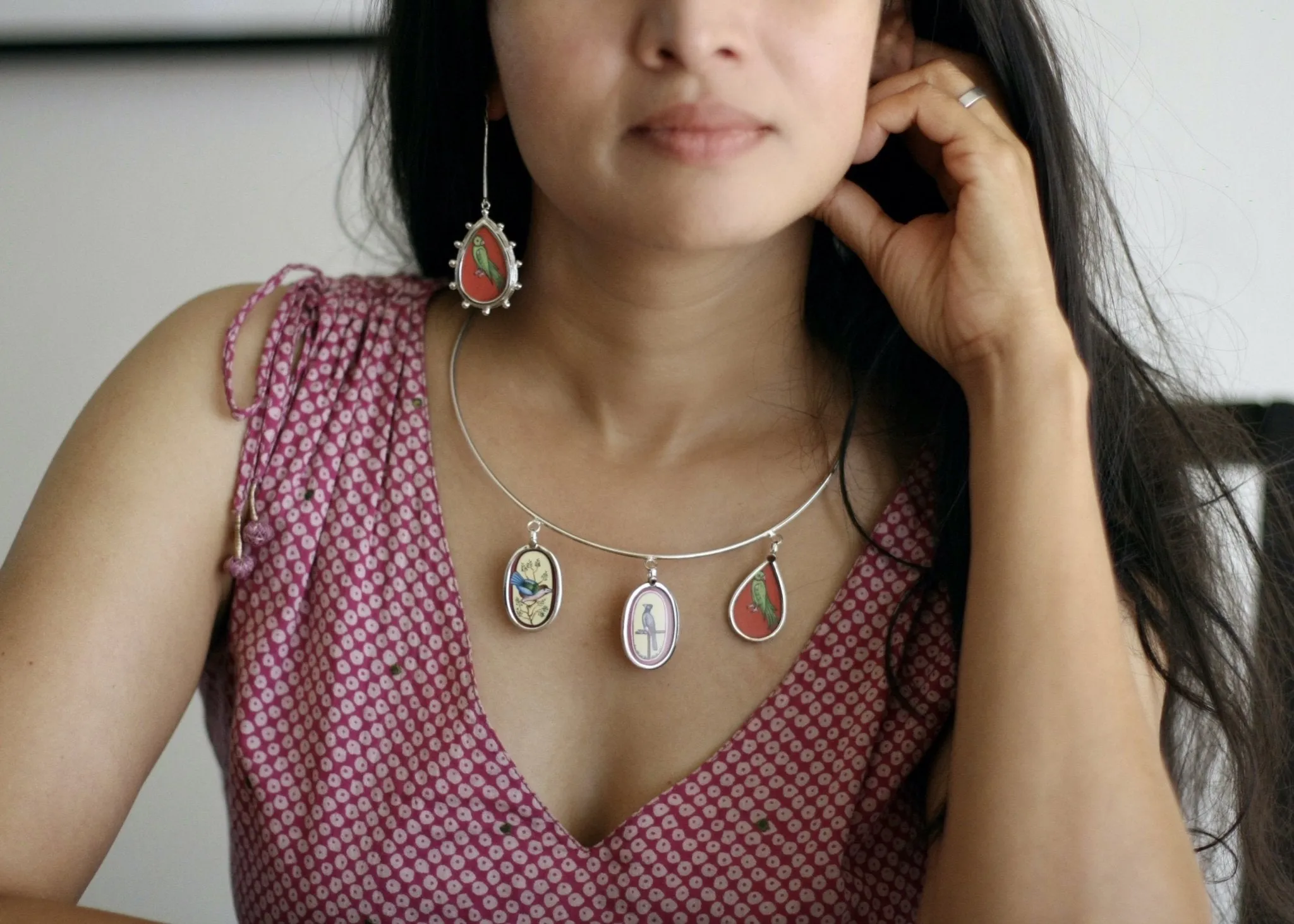 Long, sleek, dangling 'tota' (parrot) earrings