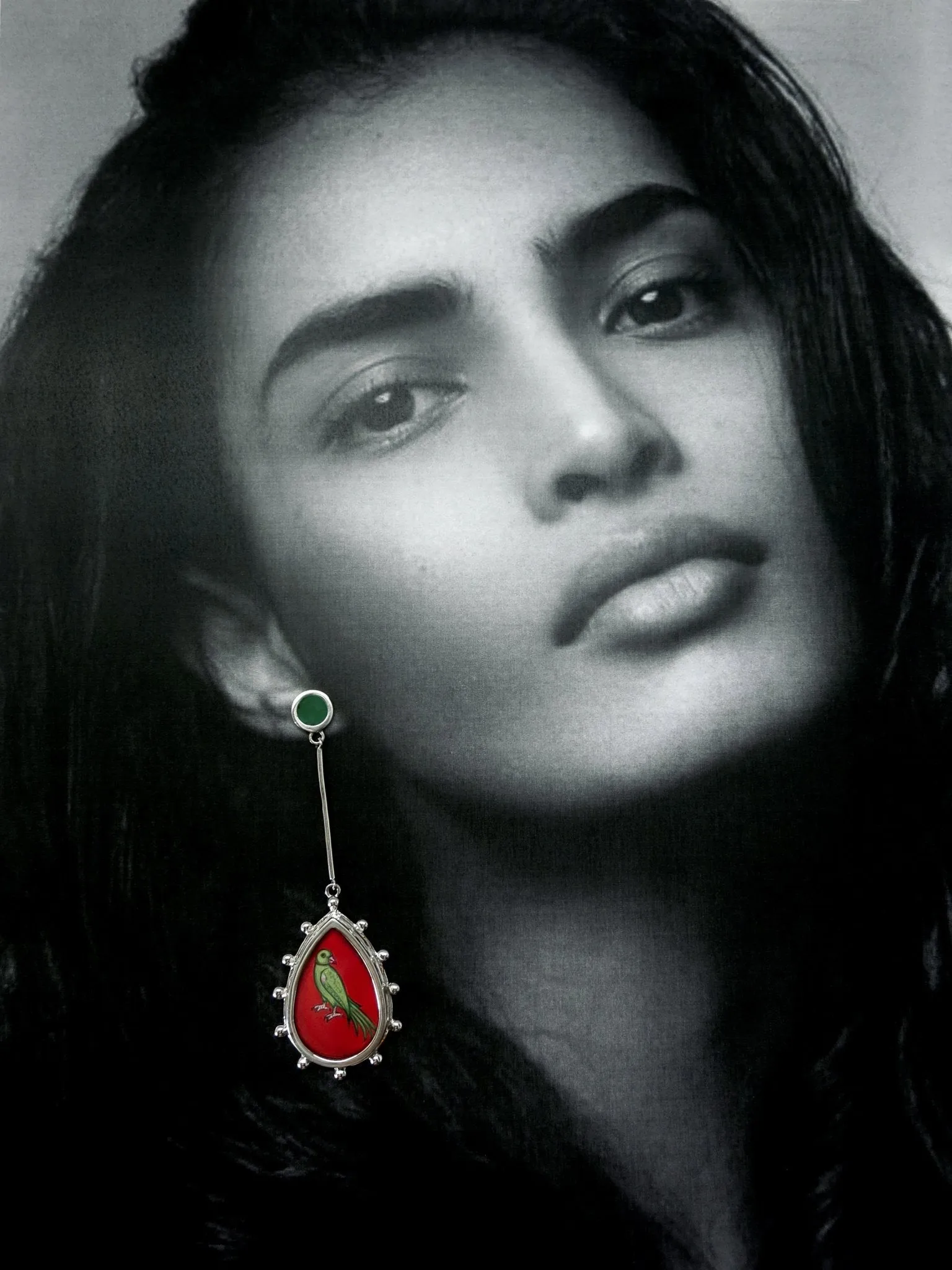 Long, sleek, dangling 'tota' (parrot) earrings