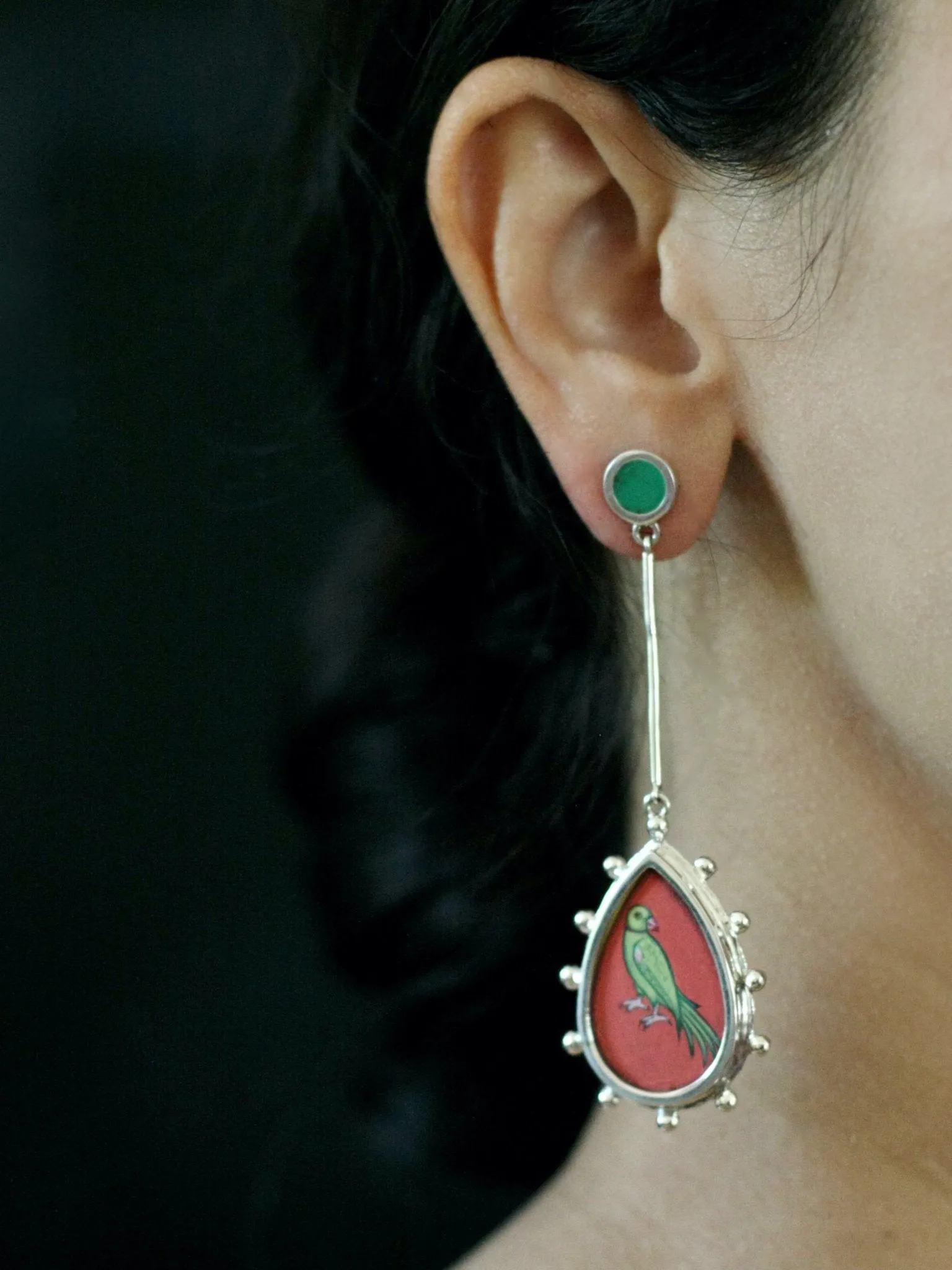 Long, sleek, dangling 'tota' (parrot) earrings