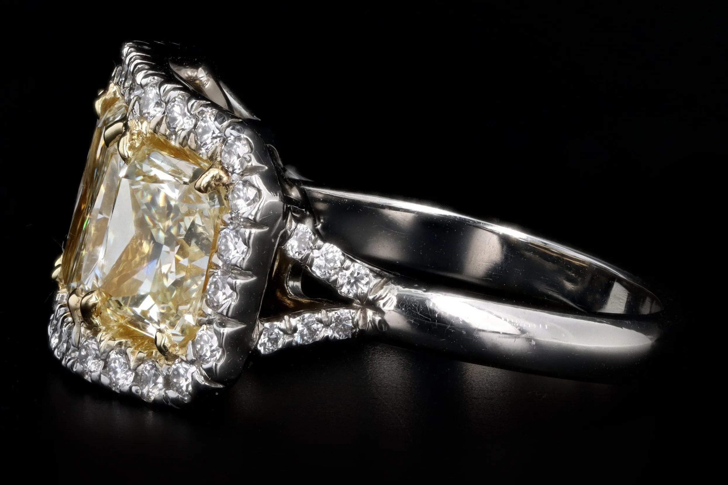 Platinum 5.89 Carat Total Weight Radiant Fancy Light Yellow Diamond Three Stone Ring