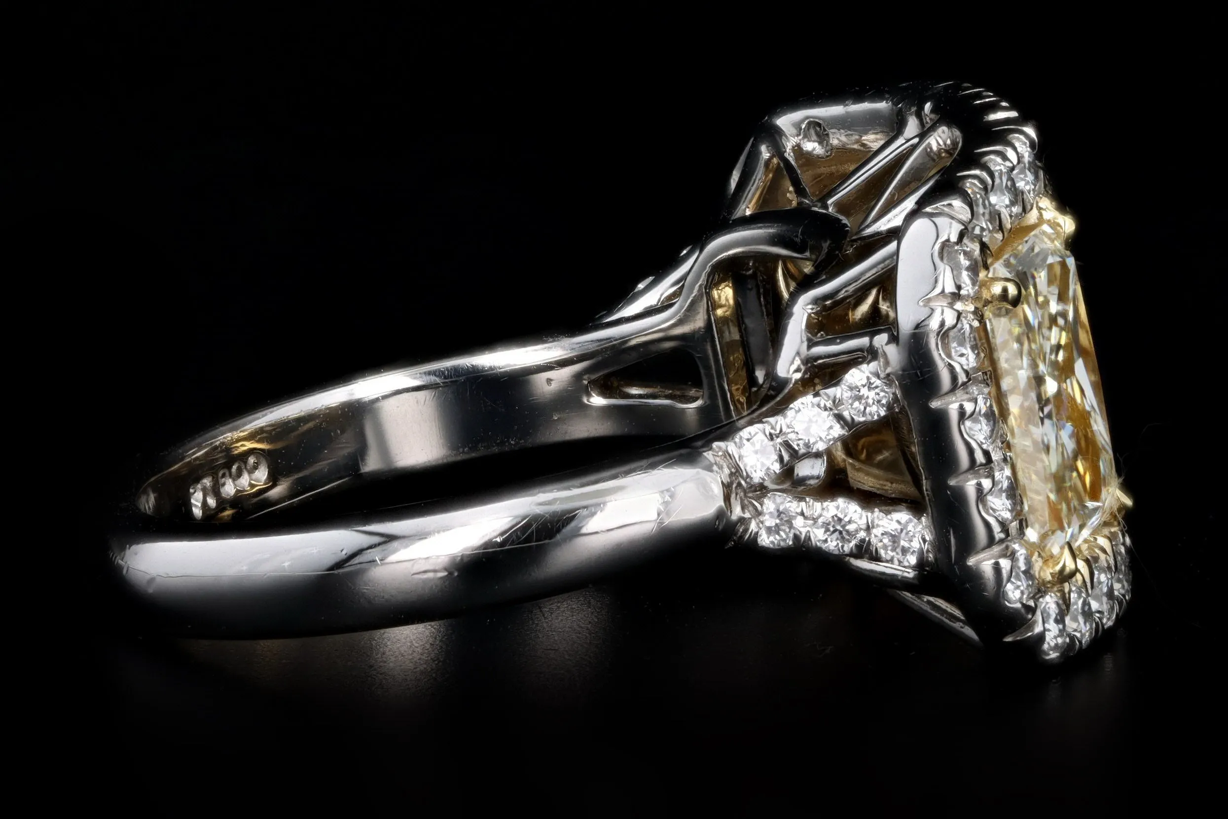 Platinum 5.89 Carat Total Weight Radiant Fancy Light Yellow Diamond Three Stone Ring