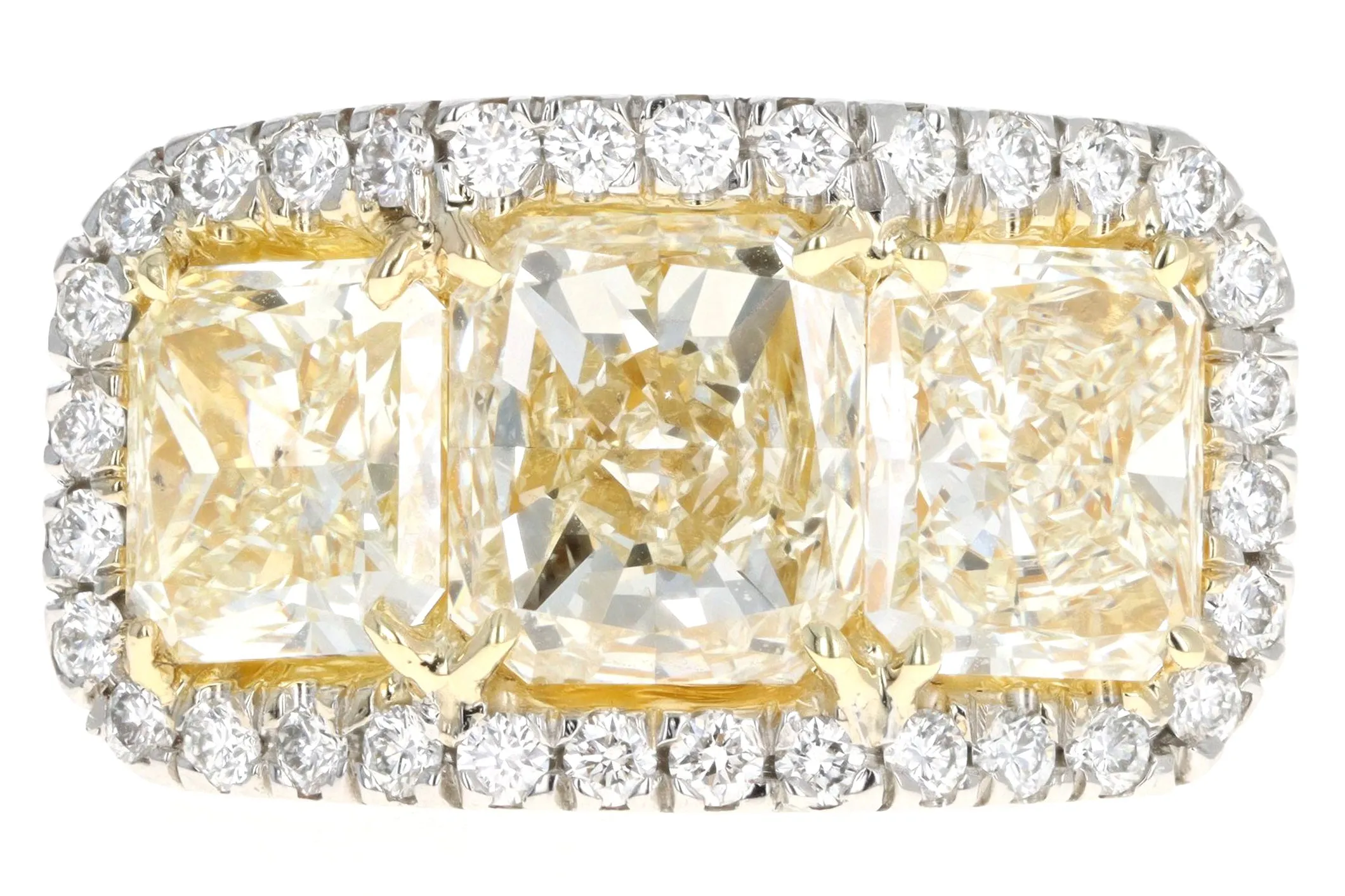 Platinum 5.89 Carat Total Weight Radiant Fancy Light Yellow Diamond Three Stone Ring