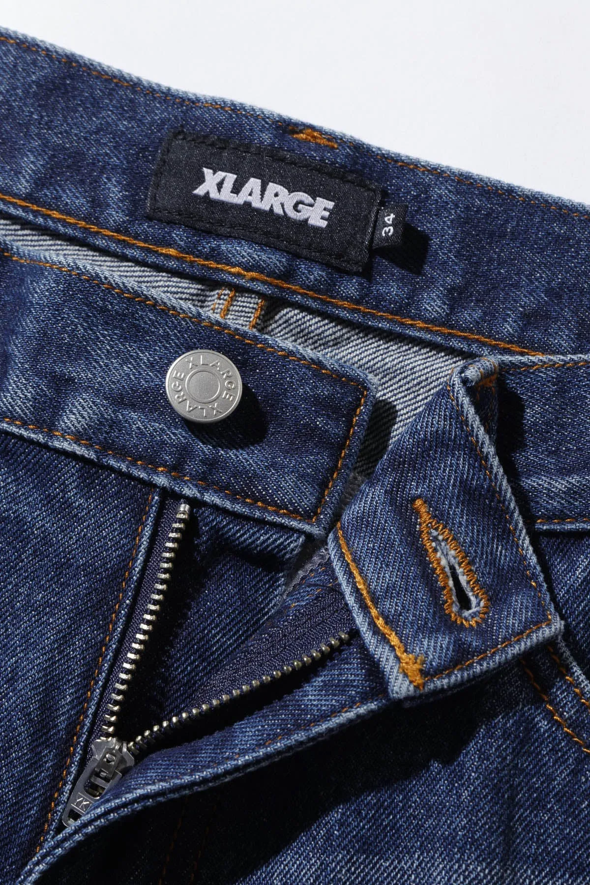 XLARGE x ED HARDY DENIM PANTS - INDIGO